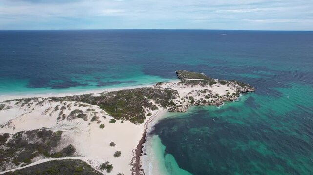 Aerial view of beautiful sandy cape beach with turquoise water and serene coastline, Jurien Bay, Australia.