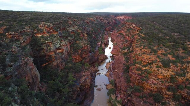 Aerial view of the rugged canyon with winding river and majestic rock formations, Z Bend lookout, Mid West Region, Kalbarri National Park, Australia.