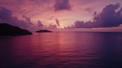 Serene Sunset Over Calm Ocean with Soft Pink and Purple Hues