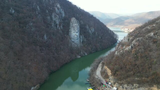 Gulf on Danube river in Big Boilers region , western Romania, where sits the carved face in stone of the king Decebal , historical figure for Romanians, aerial drone view