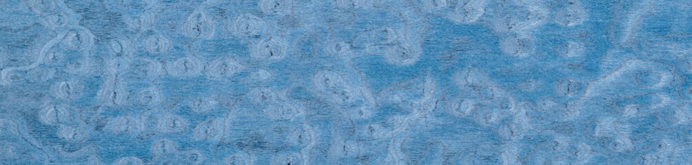 Cerulean dreams undulate in this mesmerizing ash burl veneer, a dance of azure and cobalt