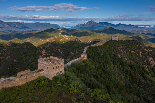 Aerial view of jinshanling great wall surrounded by majestic mountains and scenic sky, Chengde, China.