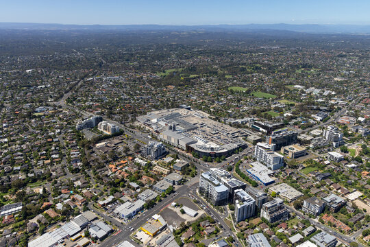 Aerial view of vibrant city skyline with modern buildings and bustling streets, Doncaster, Australia.