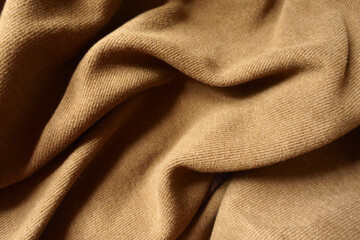 brown warm jersey fabric in soft folds