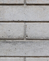 Brick background, brick gray concrete texture. Brick surface. Close up.