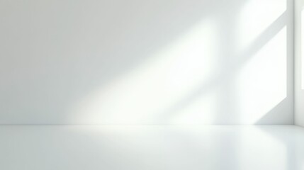 Minimalist sunlit interior with soft light and shadow for modern design inspiration