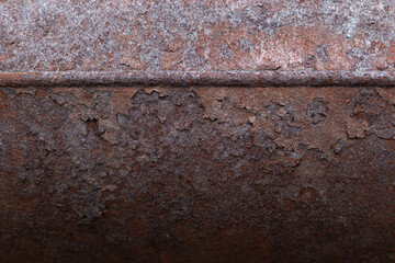 Rusty background, metal texture. Metal oxidizes with age. Rusty surfaces. Close-up from above.