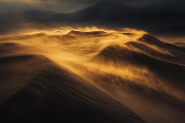 A windy desert landscape with sand blowing over smooth dunes