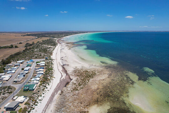 Aerial view of Hardwick Bay and Longbottom Beach with serene coastline and clear blue sky, Yorketown, Australia.
