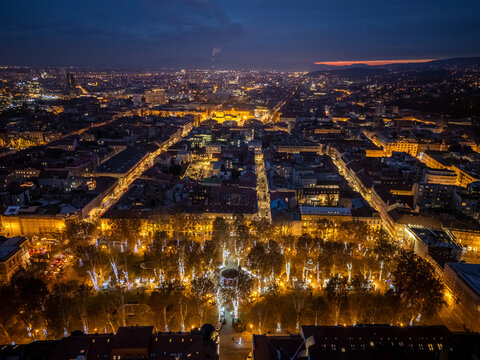 Aerial view of zrinjevac park illuminated by festive lights during the christmas market, zagreb, croatia.