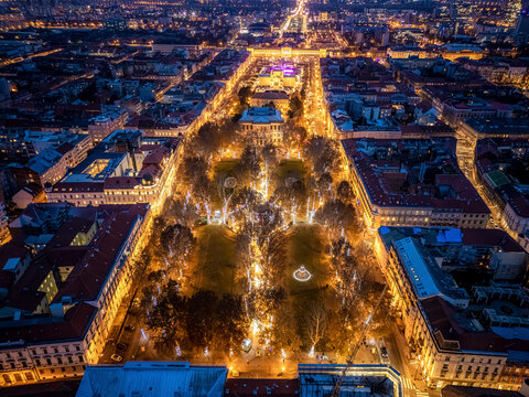 Aerial view of zrinjevac park illuminated by a festive christmas market at night, zagreb, croatia.
