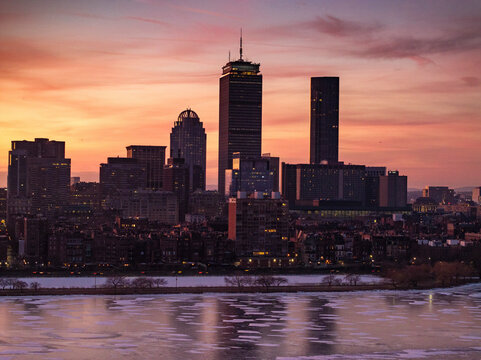 Aerial view of prudential center and charles river at sunset with a beautiful skyline, boston, united states.