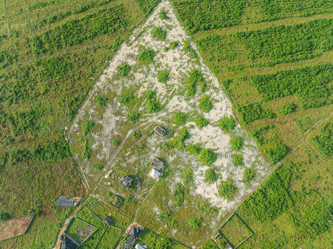 Aerial view of lush green fields and natural vegetation in rural landscape, Greater Taf City, Nigeria.
