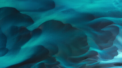 Aerial view of beautiful turquoise water with abstract shapes and patterns, Selfoss, Iceland.