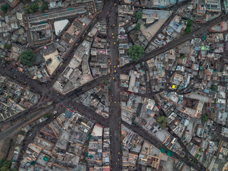Aerial view of dense urban landscape with buildings and roads in grid formation, Bikaner, India.