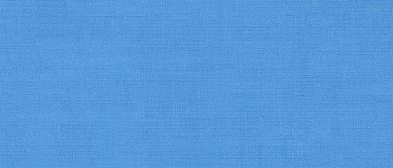 A flat, top-view texture of light blue denim fabric, showcasing its detailed weave and subtle variations in color. Ideal as a background or screensaver for fashion industry design and decoration, high
