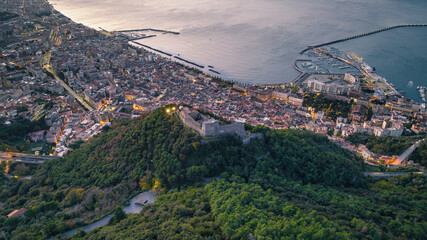 Aerial view of beautiful Salerno cityscape with historic fortress and scenic coastline, Salerno, Italy.