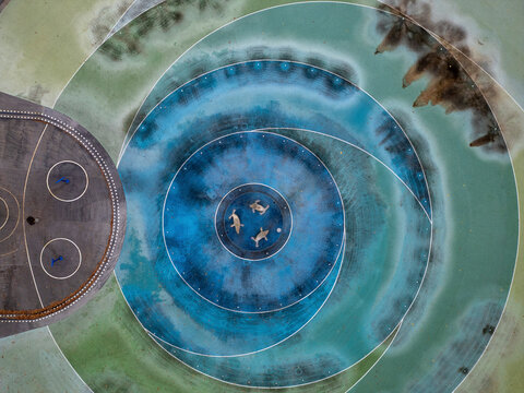 Aerial view of autumn park with beautiful patterns and circles, Planterwald, Berlin, Germany.
