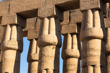 KARNAK TEMPLE - Detail of Massive columns. Famous landmark in the world near the Nile River and...