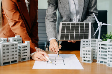Business team people planning hand using laptop for working technology and business Net zero and...