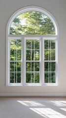 Spacious interior features large windows that provide beautiful views of the green trees in the park outside during daylight