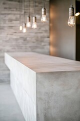 Modern reception area showcases an industrial-style desk with concrete base and steel accents. Soft focus highlights hanging Edison bulbs and exposed pipes, enhancing the trendy atmosphere