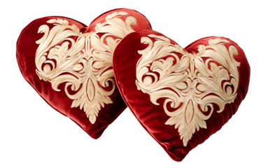 Two velvet heart-shaped pillows on white & transparent a background.