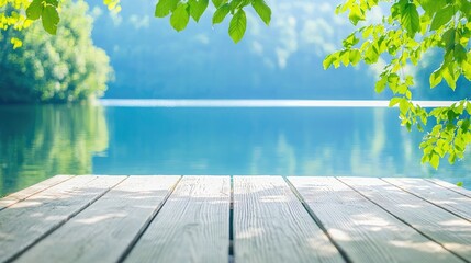 Calm lake view, wooden dock, summer foliage