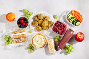 Ready prepared animal protein free quinoa salad, snack, smoothie. Quick food for lunch break, ready vegan meal overhead