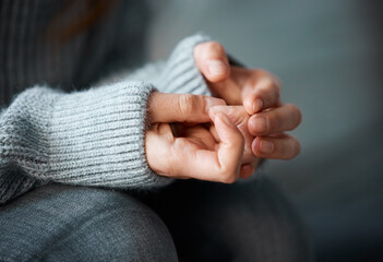 Stress, anxiety and hands of nervous person with worry, fear or abuse in closeup, home or danger....