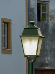 Top part of outdoor public lamp
