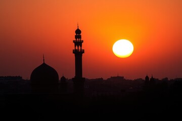 Stunning Sunset Behind Grand Mosque in Silhouette