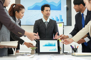 Business team brainstorming for planning strategies, laptop meeting with collaboration to present group project in office.