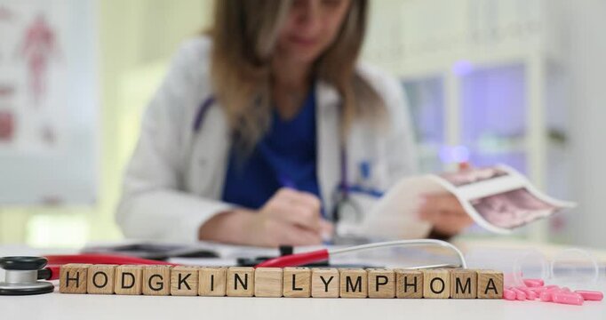 A dedicated healthcare professional thoroughly studies relevant information on Hodgkin Lymphoma and its implications