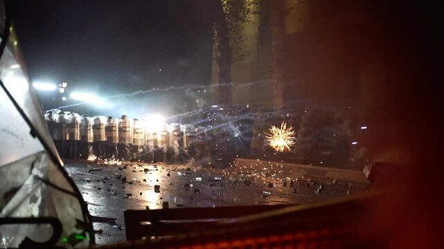 Protesters throw fireworks at police. Tbilisi. Georgia.