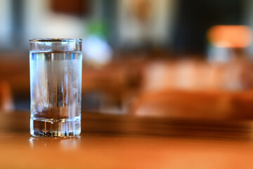 a glass of cold water on the table in the restaurant