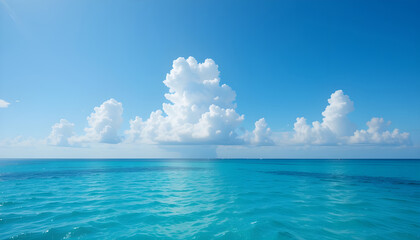 Obraz premium Serene Turquoise Ocean Meets a Cloud-Dappled Sky