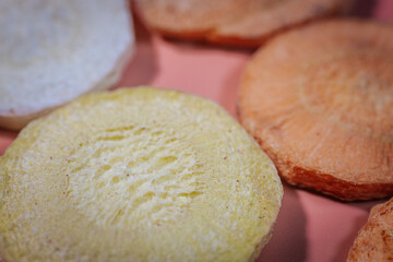 A macro shot of freeze-dried slices showcasing their deep, colorful hues, crunchy texture, and intricate patterns. Great for food, nutrition, and healthy snack themes.