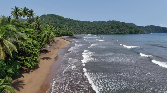 Sao Tome and Principe - Tortoise Beach Aerial View. Tropical Paradise With Golden Sand, Palm Trees, and Ocean Waves Near Praia Grande.