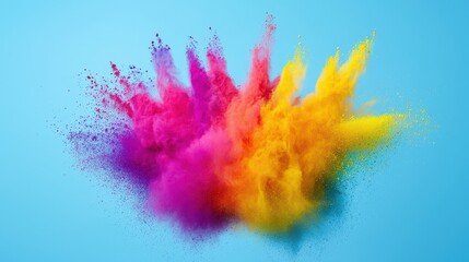 Obraz premium A vibrant explosion of colored powder creates a dynamic and artistic effect against a blue background.