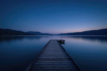 Obraz premium wooden pier stretching across calm lake surface at night, stillness, calm, wooden