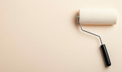 Obraz premium Paint Roller for Wall Painting Isolated on Textured Background