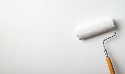 Obraz premium Paint Roller for Wall Painting Isolated on Textured Background