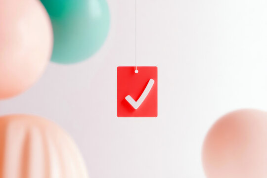 Checkmark sign on a red background suspended with colorful decorative spheres