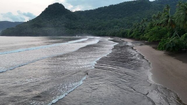 Sao Tome and Principe - Tortoise Beach Aerial View. Tropical Paradise With Golden Sand, Palm Trees, and Ocean Waves Near Praia Grande.