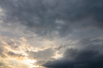 Beautiful moody sky with dark clouds at sunset, sky remplacement, nature background