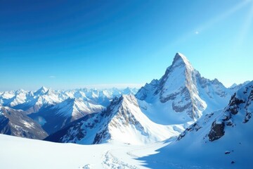 Obraz premium Snowy mountain peaks touch the bright blue sky at midday, snow, peak