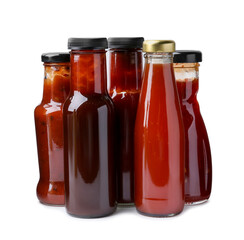 Different delicious sauces in glass bottles isolated on white