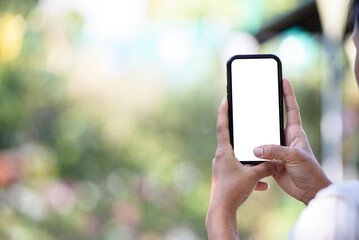 Hands take photo with smartphone cut out screen for put picture on it