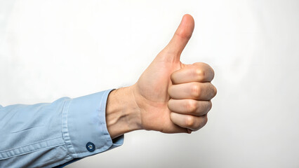 Businessman gives a thumbs up sign, symbolizing success and agreement